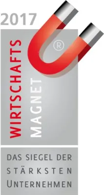 Wenker erhält das Siegel „Wirtschaftsmagnet“ Bild: Wenker erhält das Siegel „Wirtschaftsmagnet“