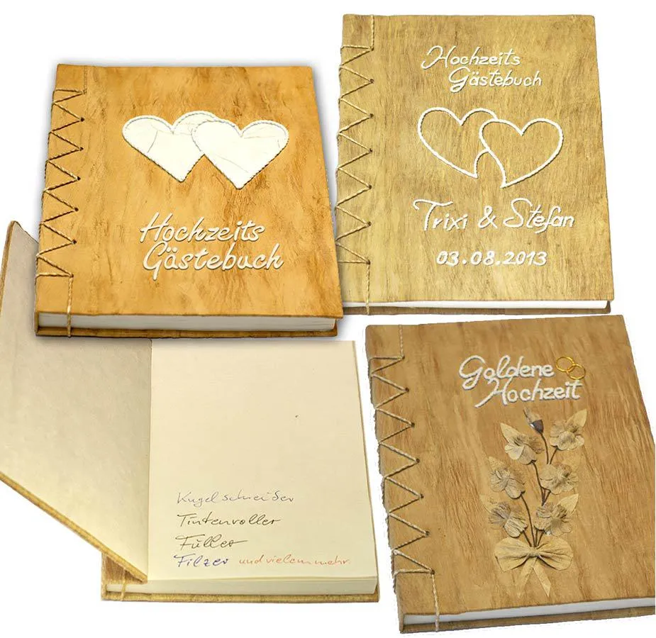 Handgefertigte Hochzeitsgästebücher aus Rinde mit SAA-Papier.