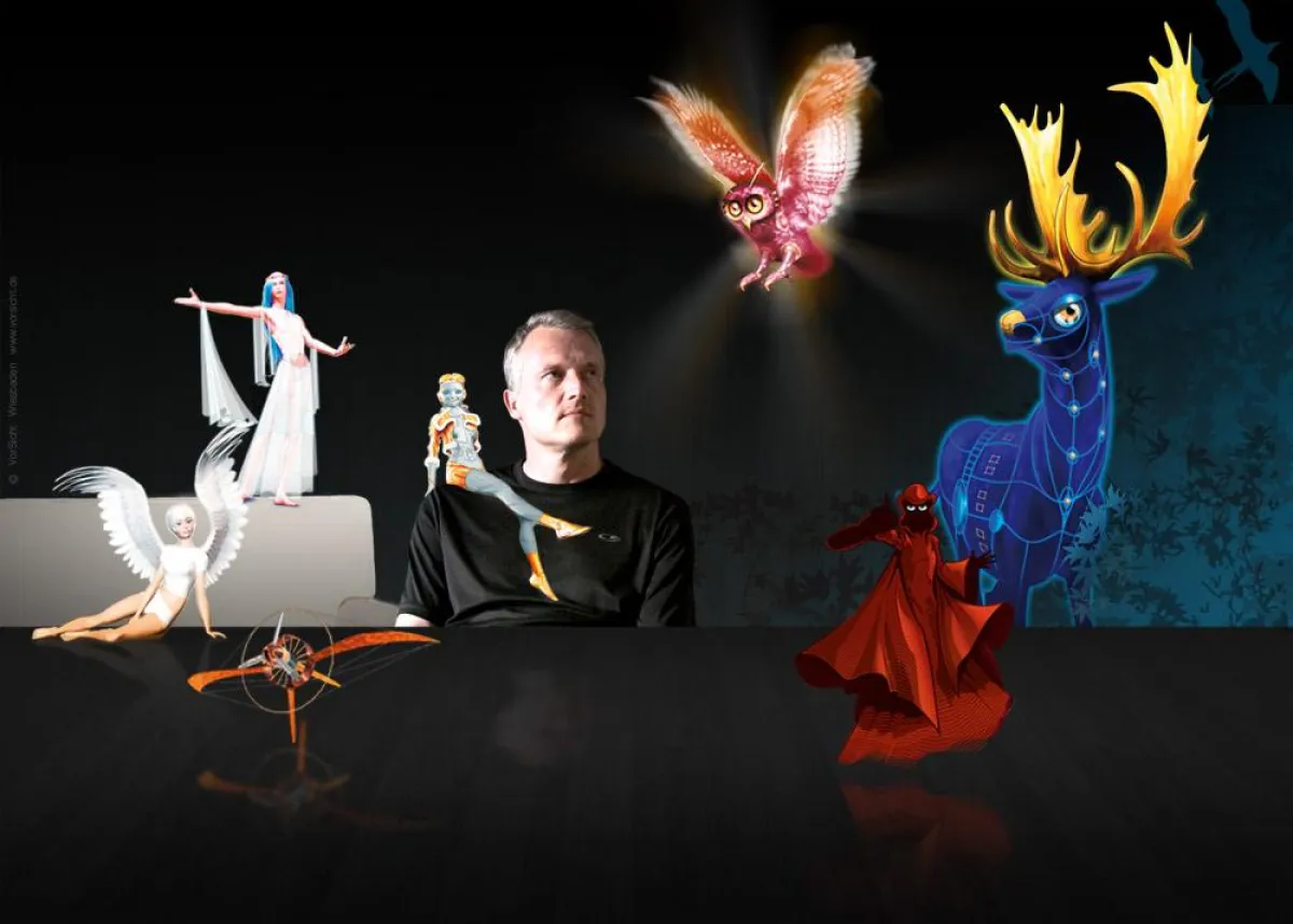 Christof Müller umringt von seinen fantastischen Wesen.