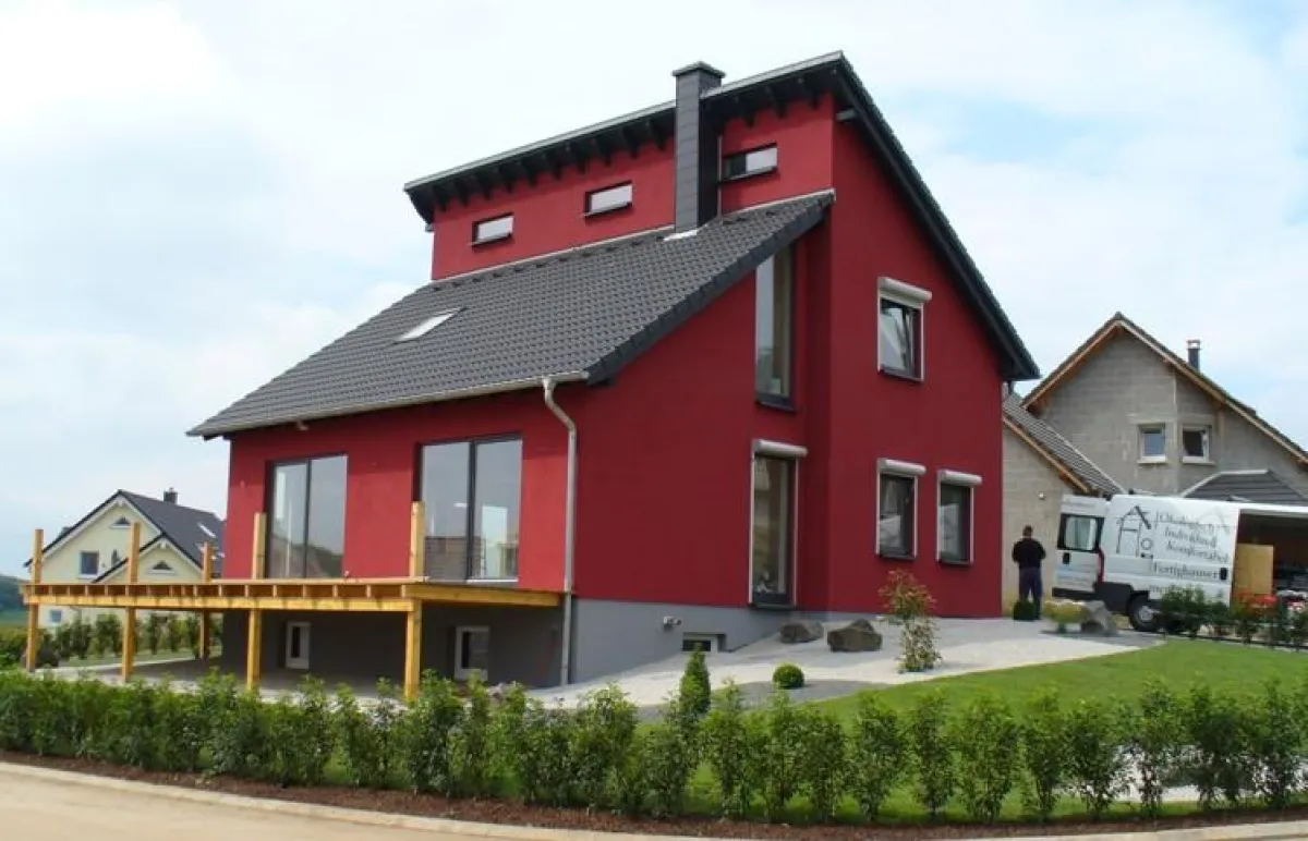 Modernes Akadien-Homes Kundenhaus mit Putdach in Holzrahmenbauweise