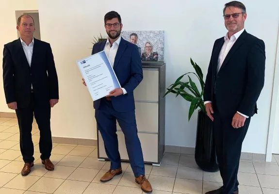 Bild: Gratulation zum 10-jährigen Dienstjubiläum