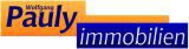 Immobilienmakler vor der Kamera Bild: Immobilienmakler vor der Kamera