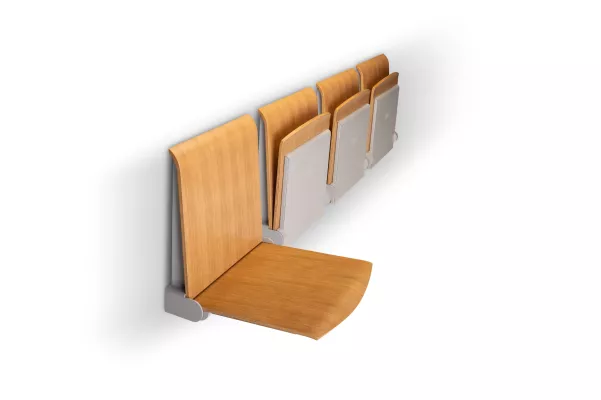 Bild: Klappbare Wandsitze schaffen mehr Platz in Fluchtwegen & Fluren