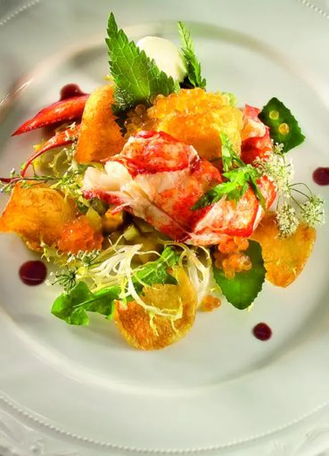 Hummer auf zweierlei konfierten Tomaten