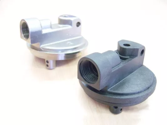 Bild: Metallsubstitution: Feuerlöscher mit Kunststoffventil