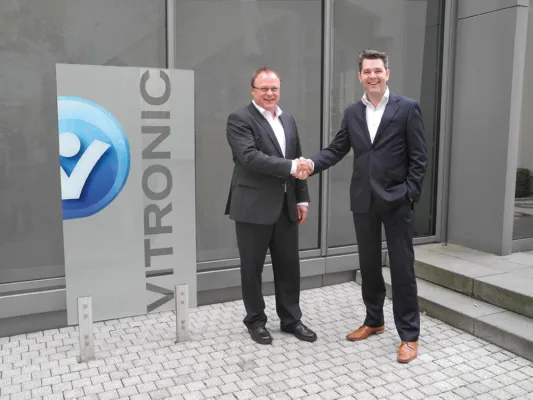 Bild: VITRONIC GmbH und TNT Nederland BV geben weltweite Partnerschaft bekannt