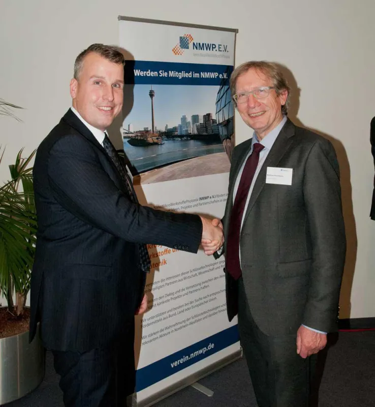 Dr.-Ing. H. Cremer (NMWP.NRW) (li) und M. Poschmann, neuer Vorstandsvorsitzender des NMWP e.V. (re)