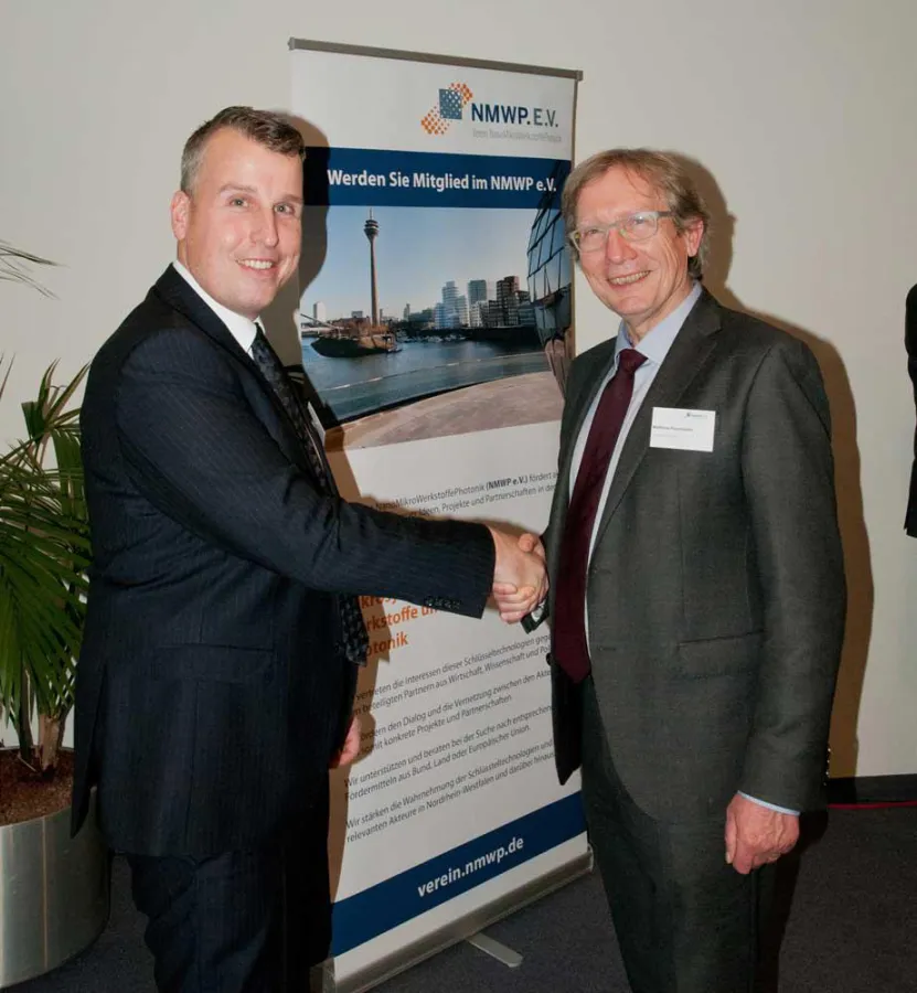 Dr.-Ing. H. Cremer (NMWP.NRW) (li) und M. Poschmann, neuer Vorstandsvorsitzender des NMWP e.V. (re)