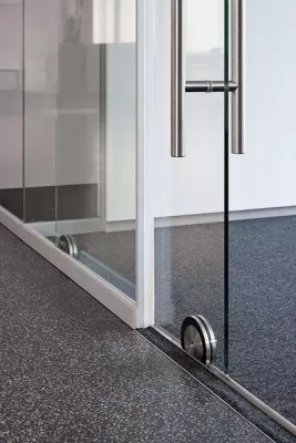 Bild: feco-Innovation: schalldämmende Glas-Schiebetür ohne Rahmenkonstruktion