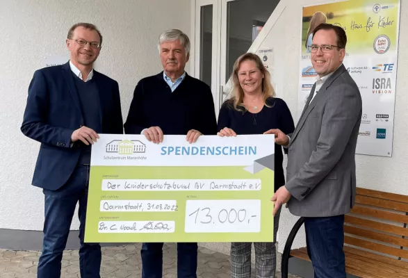 Bild: Spendenübergabe an Kinderschutzbund