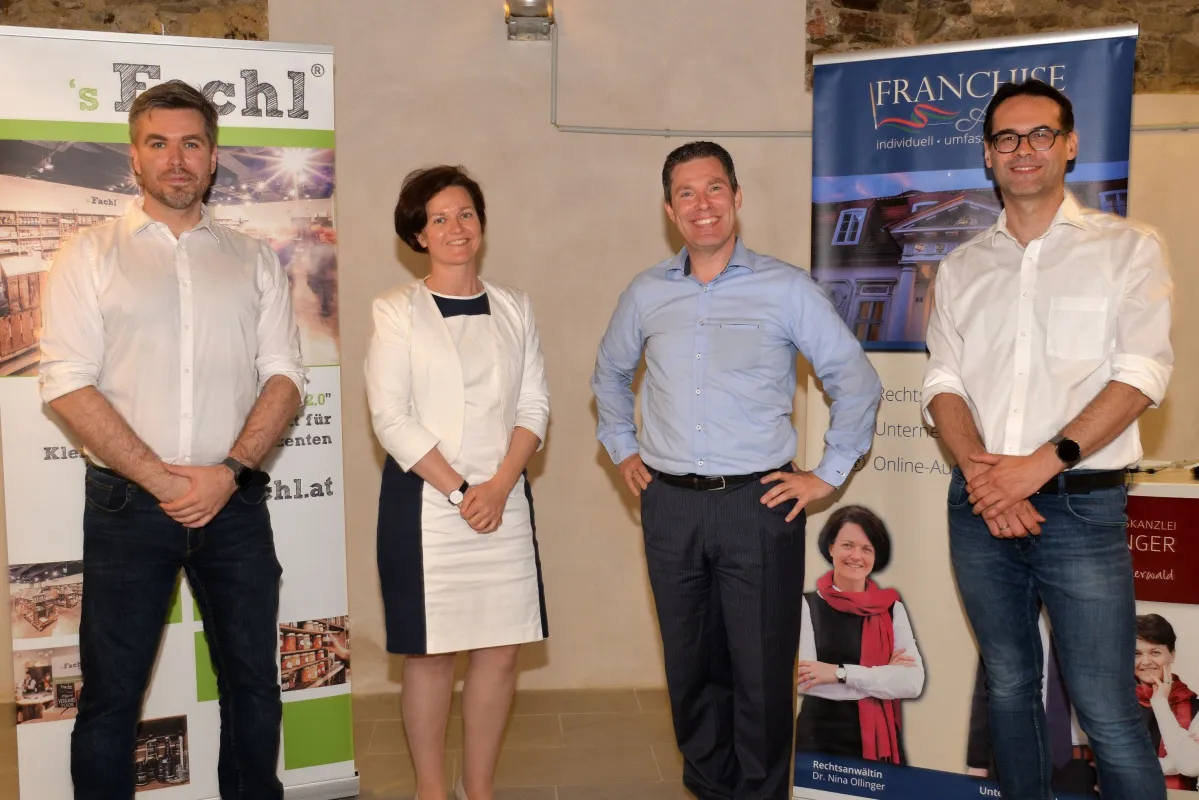 Franchise-Anwältin Nina Ollinger und Franchise-Berater Thomas Ollinger mit den Fachl-Gründern Christ (© FRANCHISE Atelier)