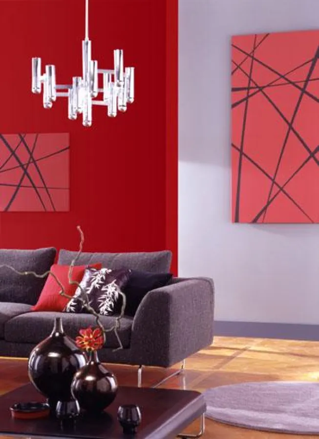 Elegante und zugleich gemütliche Wohnräume schafft die trendaktuelle Wandfarbe Dunkelrot, die an sinnliche Weinabende oder feurige Vulkaninseln erinnert. www.dulux.de