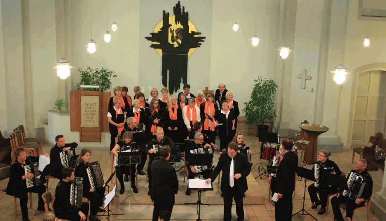 Bild: "Accordion con canto corale"
