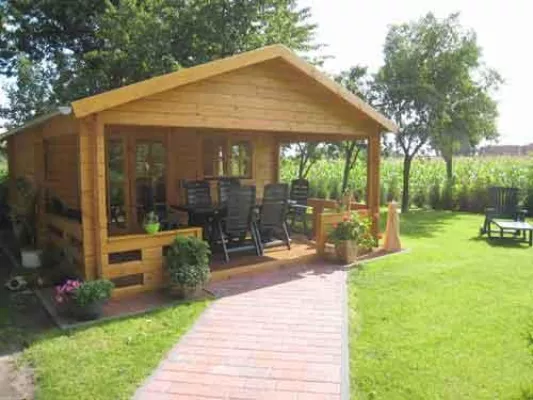 Bild: Eine Sommerresidenz im eigenen Garten - Hochwertige Blockhütten lassen Urlaubsstimmung aufkommen