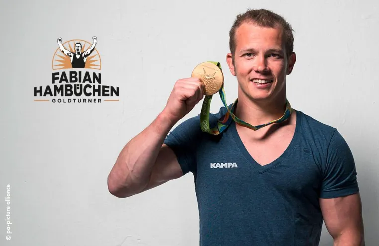 Bild: Olympiasieger Fabian Hambüchen in der FertighausWelt Köln