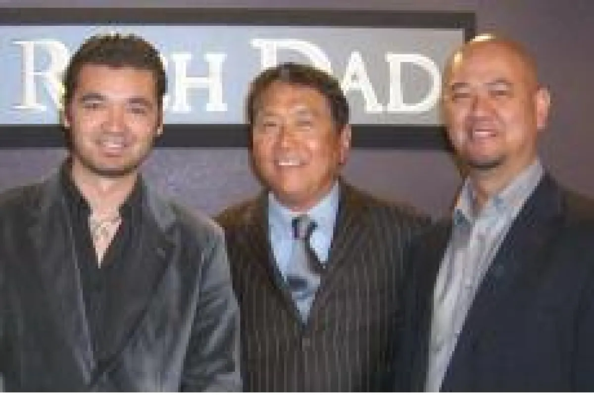 Robert T. Kiyosaki (Mitte) mit den Gründern des Cashflow-Clubs