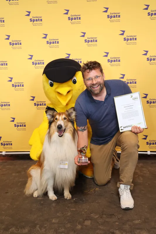 GOLDENER SPATZ, Hund Bandit (Lassie) und Hanno Olderdissen (Regisseur „Lassie - Ein neues Abenteuer) (© ©Festival GOLDENER SPATZ_Foto_Carlo Bansini_kleiner)