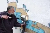 Bild: Neueste mobile Technologie in der Kleinflächen Graffitientfernung