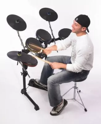 Bild: Don’t just play games - Play DRUMS - Echtes Drummer-Feeling mit dem DRUM ROCKER von ION Audio