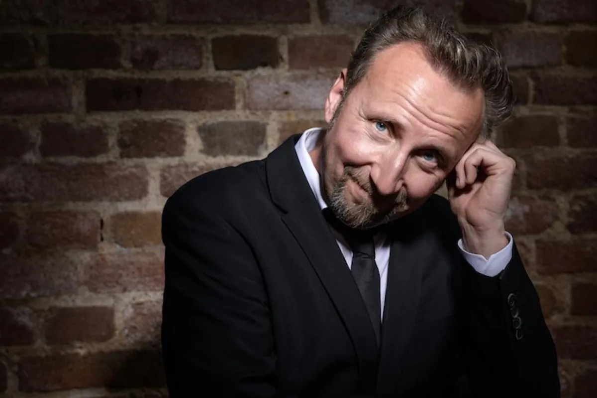 Moderator Helmut Sanftenschneider