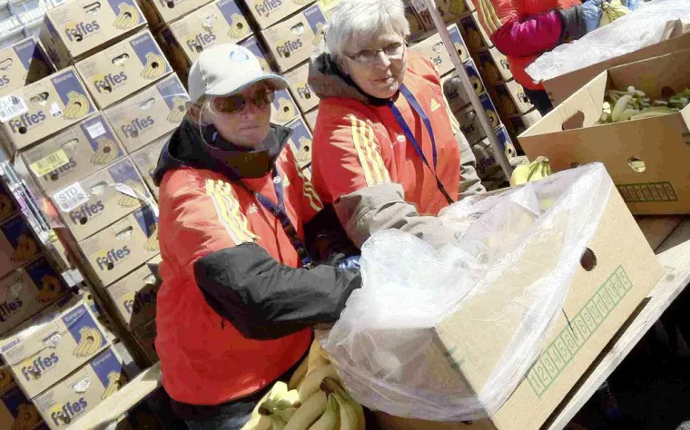 Bild: Menschen mit Behinderung als Volunteers beim Berlin-Marathon