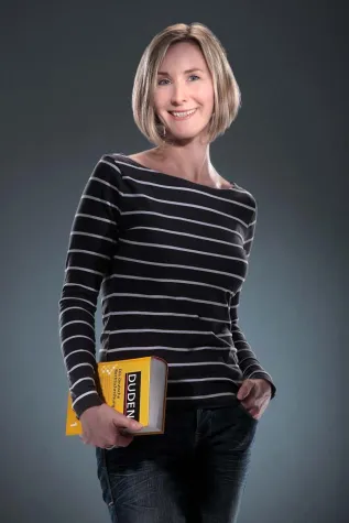 Bild: Wörter auf der Goldwaage