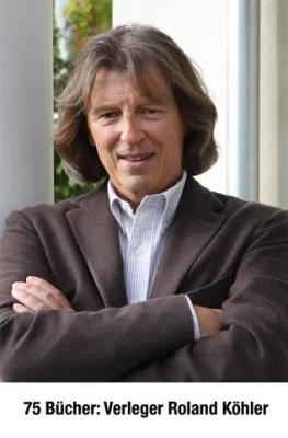 Bild: Vinum-Verleger Roland Köhler feiert Jubiläum: 75. Buch bei KünzlerBachmann Medien AG erschienen