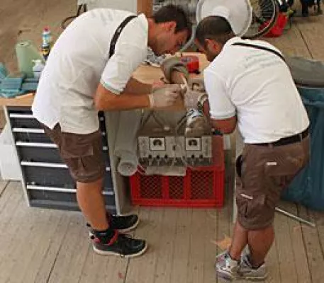 Bild: Technischer Service bei der Leichtathletik-WM des IPC
