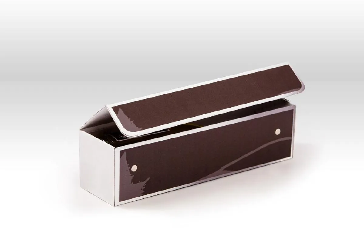 Champagner-Verpackung mit UFO-Magneten® - so haftstark, dass die Flasche auch kopfüber halt.