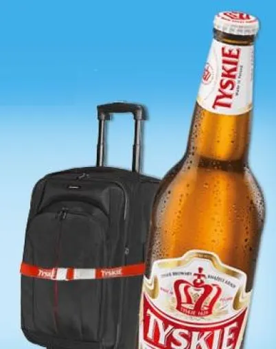 Mit Tyskie und dem rot-weißen Kofferband geht`s auf Reisen in den Sommerurlaub Bild: Mit Tyskie und dem rot-weißen Kofferband geht`s auf Reisen in den Sommerurlaub