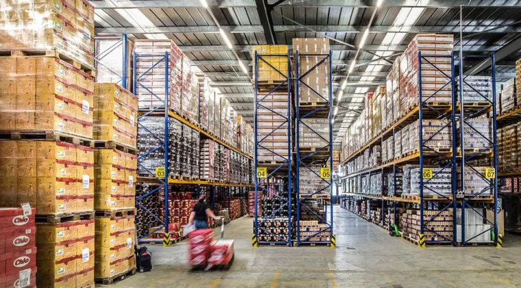 Bild: Krummen Kerzers AG sattelt auf Palettenregallager um