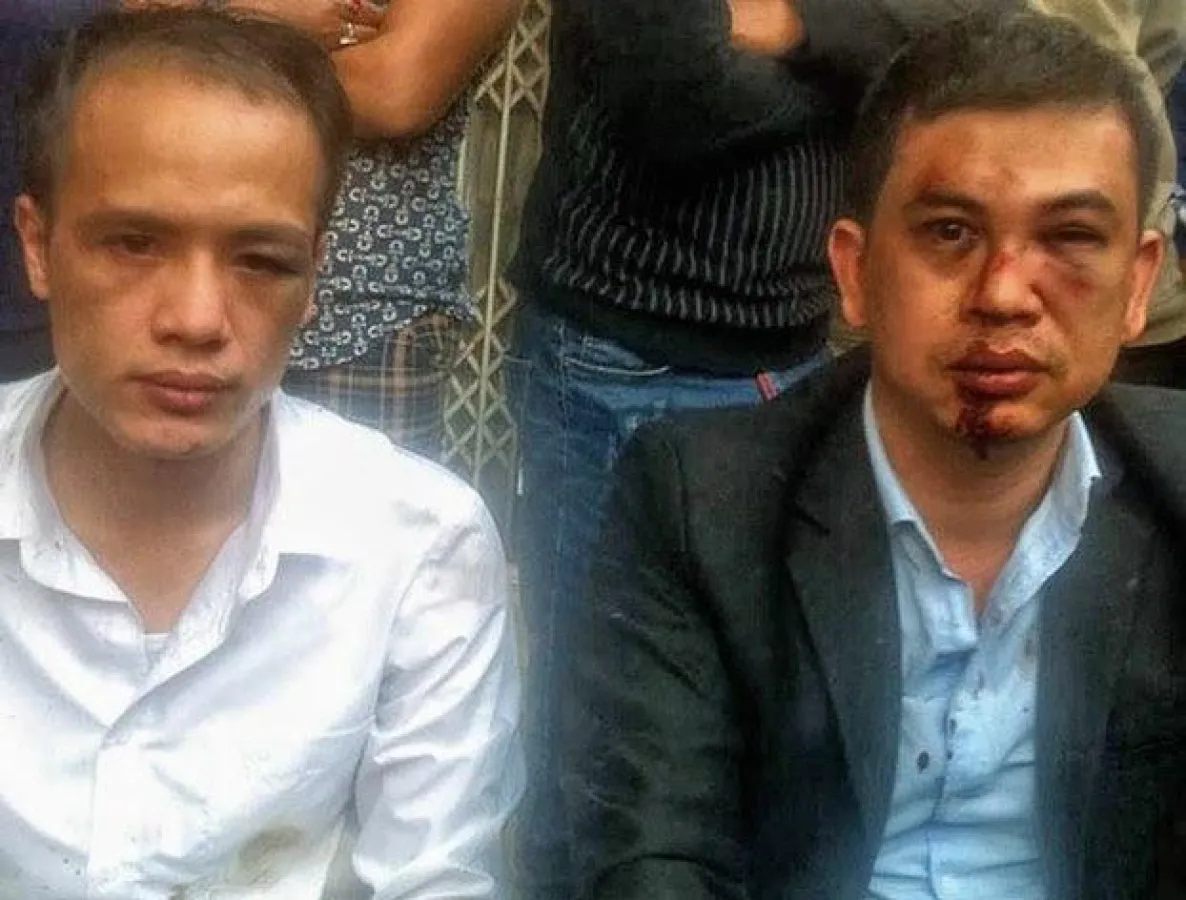 Opfer von Polizeigewalt: RAe Tran Thu Nam und Le Van Luan