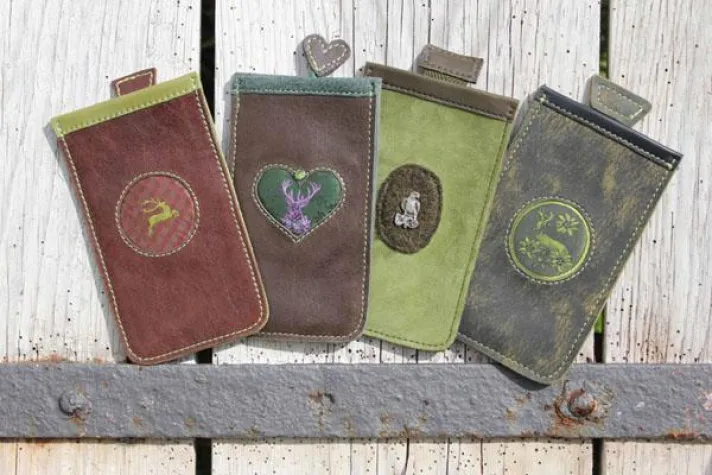 Moderner Lifestyle in charmanter Form/Praktische Handytaschen aus feinstem Leder im schicken Design Bild: Moderner Lifestyle in charmanter Form/Praktische Handytaschen aus feinstem Leder im schicken Design