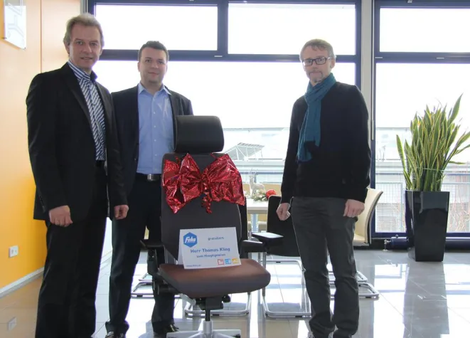 Bild: Gewinnübergabe Kundenumfrage