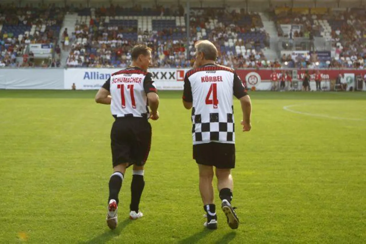 Michael Schumacher und Charly Körbel
