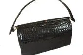Bild: Kontrovers – der Handel mit gebrauchten Koffern und Handtaschen aus Schlangen- oder Krokoleder