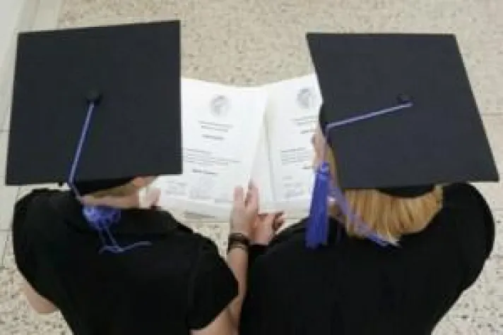 Ein Aushängeschild wird beleuchtet Bild: Ein Aushängeschild wird beleuchtet