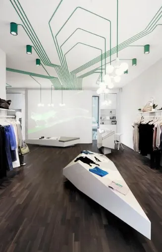 Bild: Öko-Mode in coolem Ambiente: KINZO baut Hamburger Fashion-Boutique mit Sonderleuchten von idee.design.licht.