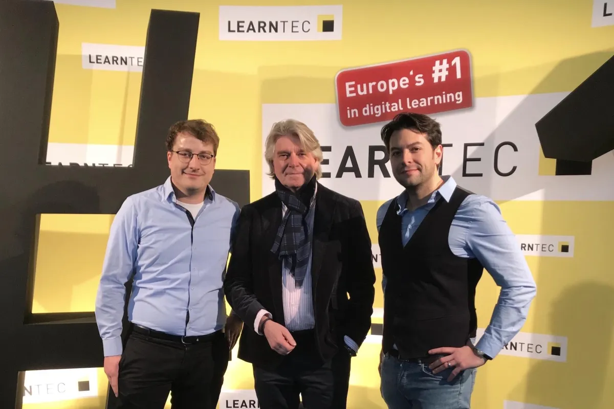 Florian Sturm, Prof. Dr. Peter Niermann und Fabrizio Palmas auf der LEARNTEC 2019