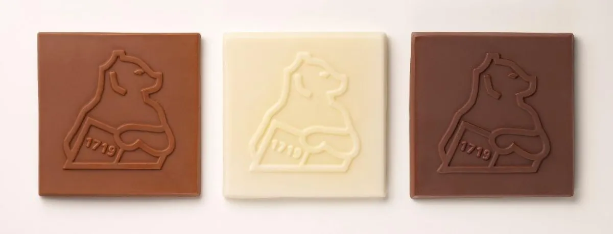 Schokologo des Wiesbadener Musikverlags Breitkopf & Härtel: Bär mit Gründungsjahr 1719