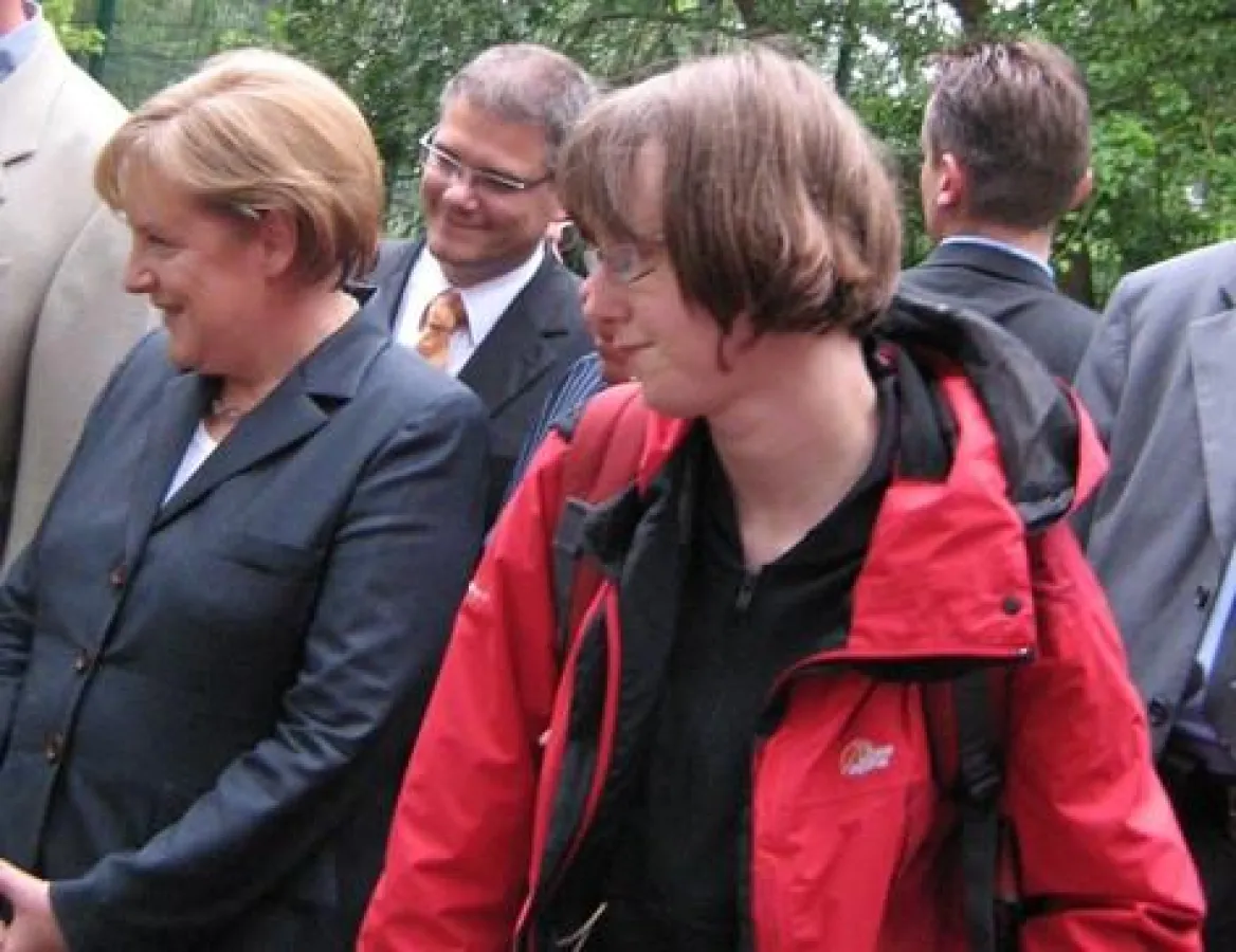 Teilnehmerin zusammen mit Bundeskanzlerin