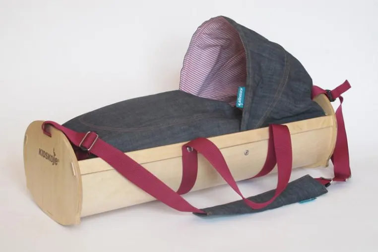 Bild: Kidskoje, erste tragbare Babywiege und Spielwagen