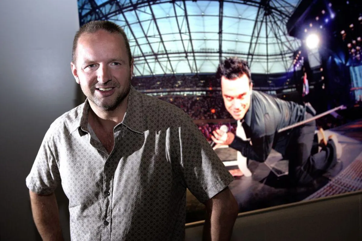 Ralph Larmann vor Robbie Williams