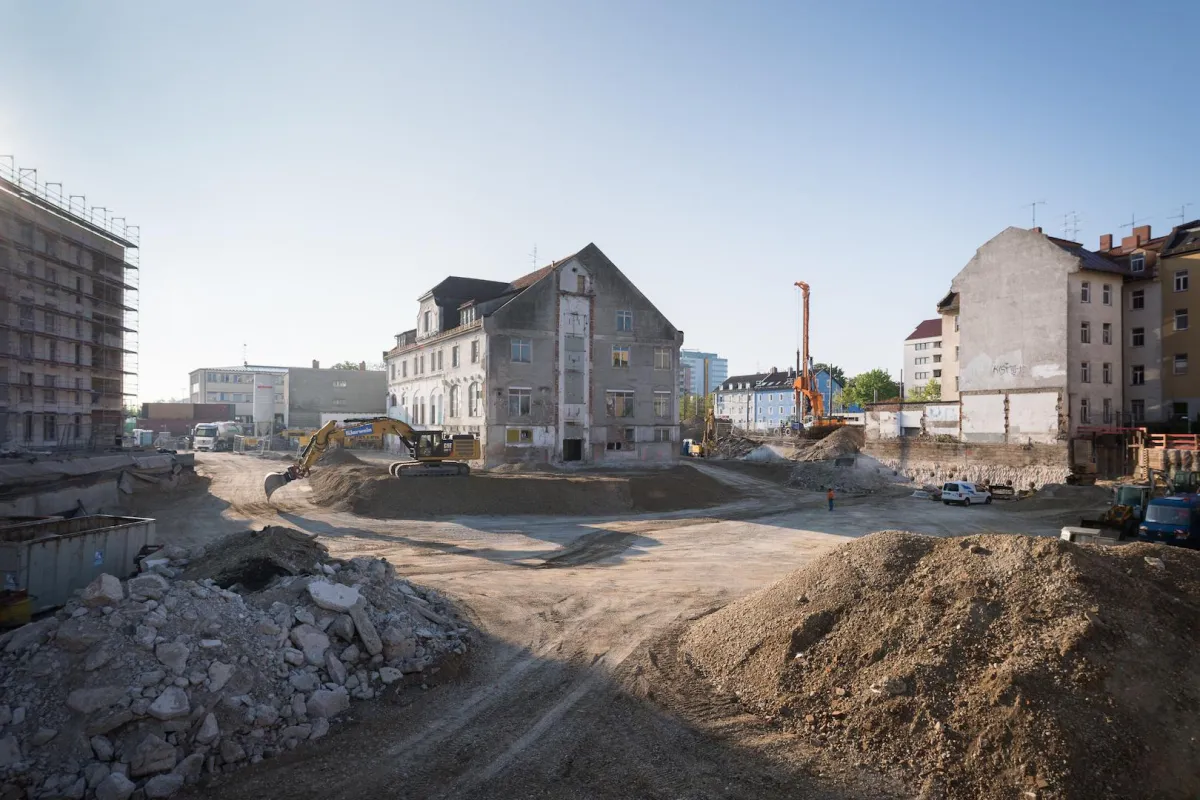 Baustellenblick: „kupa - Quartier Kuvertfabrik Pasing