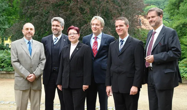 Bild: Internationales Gespräch anlässlich der Ernennung von Dr. Eichhorn und Dr. Angermüller zu Professoren
