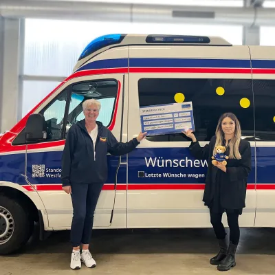 Bild: KKC-Team spendet 750 Euro an den ASB-Wünschewagen Westfalen
