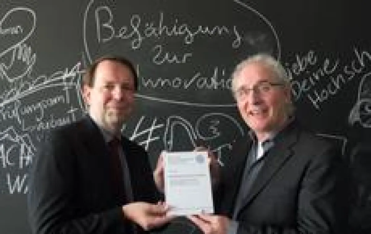 RFH-Präsident Prof. Dr. Martin Wortmann und Prof. Dr. Axel Faix ()