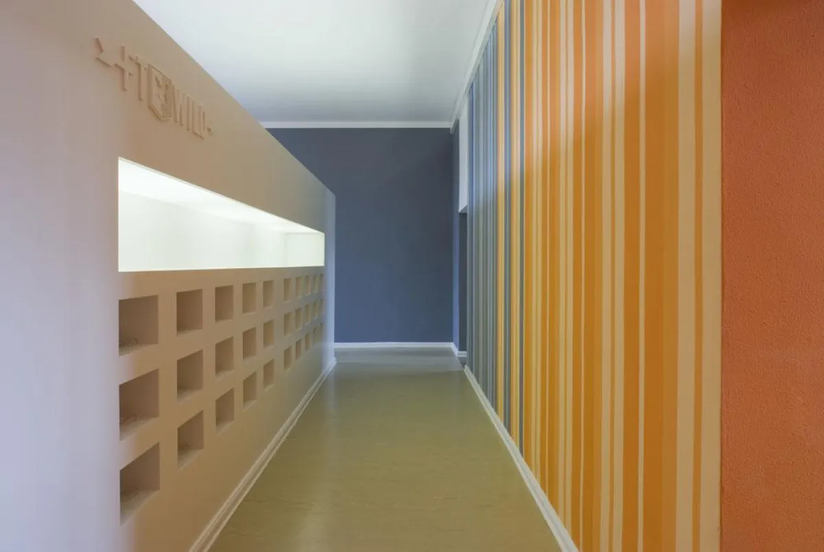 Postamt: Der Charakter ehemaliger Amtsflure inspirerte bei Farbe und Form der Innengestaltung