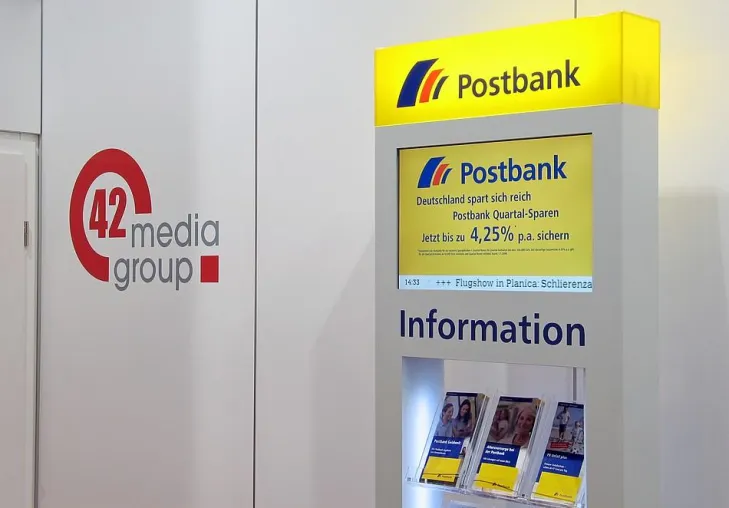 Bild: Die Instore-TV-Projekte Postbank und MediMax setzen Standards im deutschen „Digital Signage“-Markt