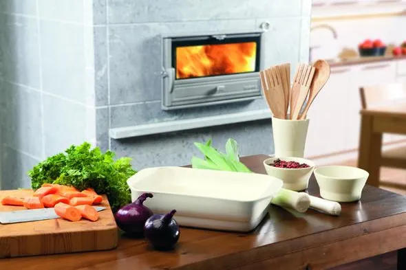 Bild: Kochen, Backen und Heizen mit Speckstein - Tulikivi-Öfen mit Backfach